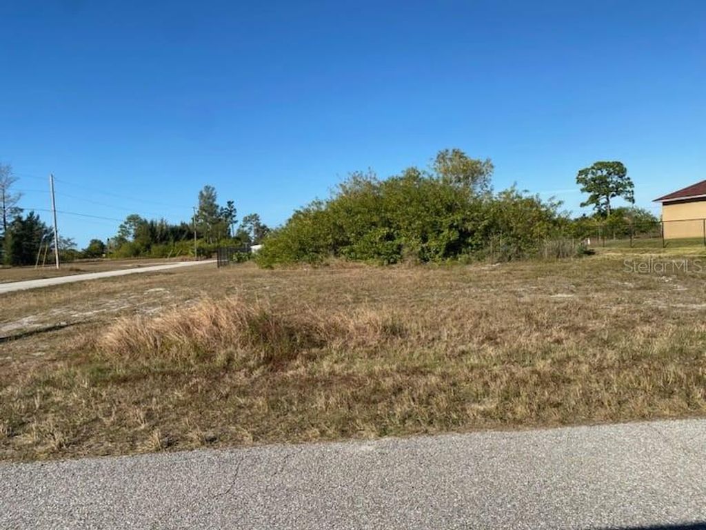 Photo of 2002 NE 6th Pl, Cape Coral, FL 33909 (MLS # O6374808)