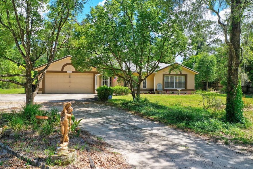 Seclusion AND convenience - You can have both!
This 3 bed 2 bath slit floorplanFamily home sits on 1.25 acres of secluded woodland and is set well back from the road.
Plenty of parking for Family and friends - and there's room for a RV alongside the house.
Build a workshop/ Toy store and a pool if you like - there's plenty of room.
Tile and wood laminate flooring with carpet in the bedrooms. The half bath is accesed from the 24ft x 12ft Florida room where you can watch the birds.
Family room off the kitchen / nook area plus separate formal dining room and living room.
Only minutes from I-4 (exit 114) or downtown DeLand. ;Water: City