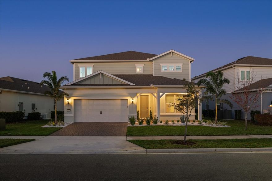 Tucked within the gates of the highly sought-after Isles of Lake Nona, this home presents a beautifully designed residence featuring the privacy of no rear neighbors. Inside, the main living area immediately captures attention with its stylish custom entertainment center featuring LED backlighting and a sleek electric fireplace, creating a striking focal point that elevates the entire room. Natural light pours through expansive windows, while the open-concept design allows the living spaces to flow effortlessly into the kitchen and outdoor areas.The chef’s kitchen is both functional and visually impressive, appointed with quartz countertops, top-of-the-line stainless steel appliances, a spacious center island with seating, and a stunning mosaic tile backsplash that adds texture and character.  One of the home’s most impressive features is the seamless connection to the outdoors. Expansive pocket sliding doors open completely to the covered lanai, creating a true indoor-outdoor living experience that is ideal for entertaining or simply enjoying Florida’s beautiful year-round sunshine. The primary suite serves as a private retreat, offering a spa-inspired bathroom featuring a large walk-in shower, dual vanities, and elegant finishes, while the expansive custom closet with built-in organization provides both style and practicality. Step outside to your own private outdoor oasis. The covered lanai with retractable screening allows you to enjoy the space comfortably year-round, while the spacious pool deck and beautifully designed pool area provide the perfect setting for relaxation or entertaining guests. With no rear neighbors, the backyard offers an added sense of privacy rarely found in the area. Living in Isles of Lake Nona means enjoying a true resort-style lifestyle. Residents have access to a beautifully designed clubhouse, a fully equipped fitness center, a resort-style pool complete with splash pad, multiple playgrounds, and sports courts for basketball, tennis, and pickleball. The community’s prime location places you just minutes from Lake Nona Town Center, Medical City, the USTA National Campus, top-rated dining, shopping, and entertainment, making it one of Orlando’s most dynamic and desirable areas.