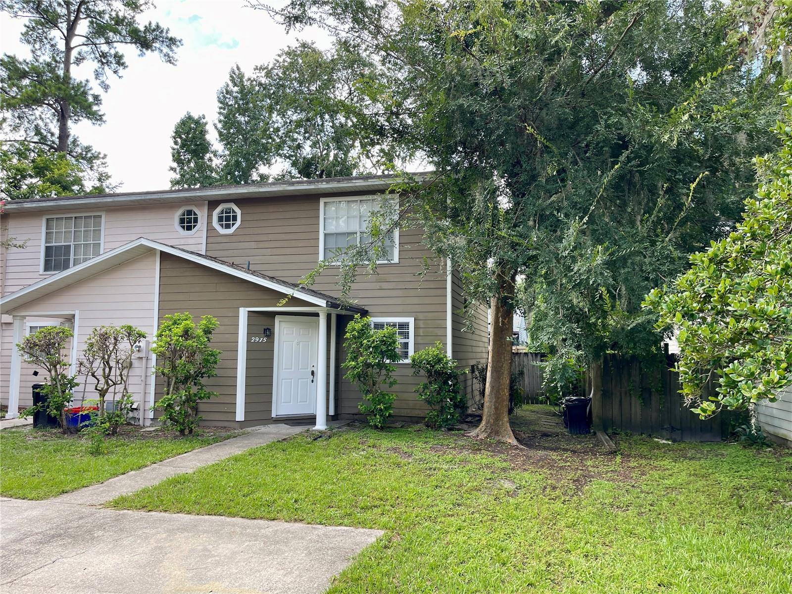 Enjoy this spacious end unit with a great back deck and yard space. Downstairs bathroom renovated in 2025. Lots of kitchen counter space, bathroom skylight for natural lighting. Laundry closet with washer and dryer included. Close to UF, Shands, shopping, restaurants, and Butler Plaza.