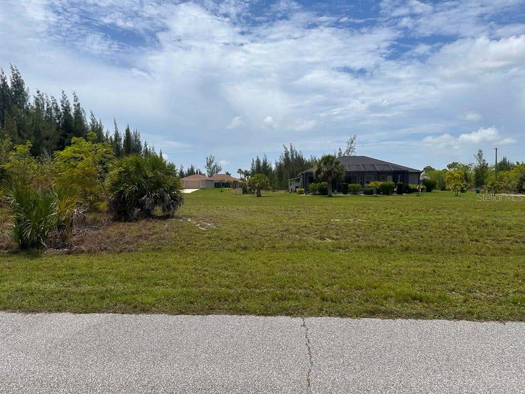 Photo of 9243 Lingle Street, Port Charlotte, FL 33981 (MLS # O6414588)