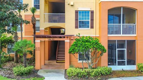 Photo of 8630 Buccilli Drive #309, Orlando, FL 32829 (MLS # O6343472)
