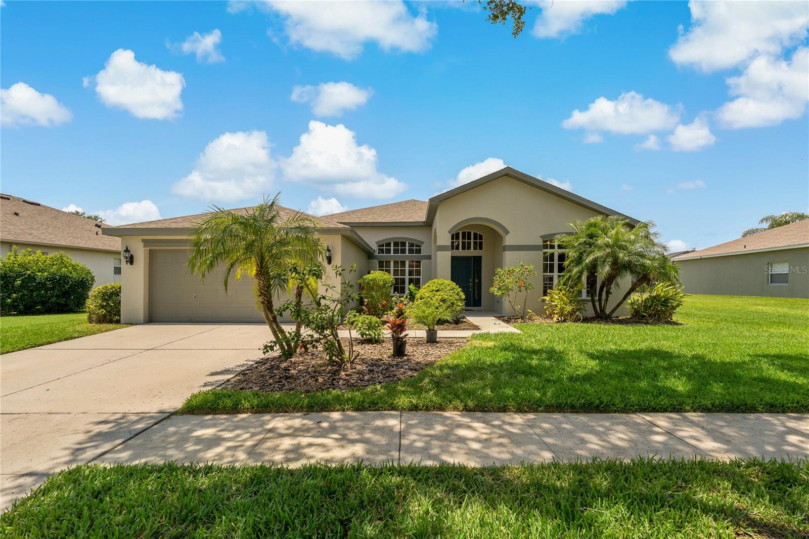 Ready to move in Paradise is all yours !! This 4 bed & study/Den and 3 bath home in Fishhawk Ranch community. Home welcomes you with freshly painted exterior. Walk through the paved porch into the house to experience the magic. Soaring ceilings with a huge open floor plan makes a dramatic first impression. Study/Den is on the right hand side as you walk through the front door. Big living/dining/family combo is just perfect for entertaining and have a lively experience that brightens your day. Kitchen boasts with brand new QUARTZ counter top and SS appliances. Kitchen comes with RO system for drinking water. Separate breakfast area is convenient for busy mornings. Split floor plan offers plenty of privacy for everyone. Huge master suite is just great. Master bath comes with double vanity, walk in shower and huge garden tub. Three other bedrooms are located on the other side are good sized. Jack and Jill bedrooms with a double vanity is just perfect. The third bedroom has its own full bath making the guest suite great. Walk into the back patio from 3 access points to enjoy spacious travertine stoned patio area. Backyard has a nice water view to enjoy pleasant evenings. Water for whole house goes through brand new water softener. Notice the NATURAL GAS connection and RECLAIMED WATER water for sprinkler system for reduced utility bills. NEW ROOF--2022 ,AC UNIT 2021, WATER HEATER, 2018 makes you relaxed. Fishhawk ranch community is a master community with more than 10 miles walking trails, Olympic size pools, Tennis courts, basket ball court and skate park, indoor theatre, convenient shopping with in the community you name it. Community is zoned for the best schools in the county. House is zoned for Fishhawk Creek, Randall and Newsome schools. Schedule your private visit today!!