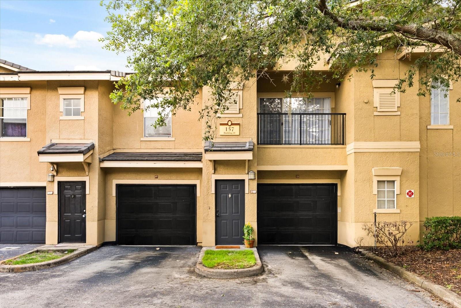 One or more photo(s) has been virtually staged. Elevated living in one of Lake Mary’s most desirable gated communities—Notting Hill at Oakmonte - This second-floor condo with a private first-floor entry offers 846 square feet of fully updated, move-in-ready space—perfect for anyone! Step inside to find a well-planned 1-bedroom, 1-bath layout featuring quality finishes, efficient use of space, and a modern, updated feel. The home features brand new vinyl plank flooring throughout, new baseboards, elegant crown molding, new LED lights/light switches and a bright, freshly painted, color palette that enhances the natural light and modern finishes. The kitchen is a true standout, complete with new stainless steel appliances, newly installed quartz countertops offering a clean and contemporary feel. There is also a new hot water heater, garbage disposal and faucets! Just off the kitchen, you’ll find a full laundry room with new washer and dryer for added convenience. The bathroom boasts brand new vanity, mirror and toilet. Step outside to your private balcony, perfect for relaxing or entertaining, and enjoy the bonus of a private storage closet for bikes, seasonal items, or extra belongings. Notting Hill offers a resort-style lifestyle with impressive amenities including two community pools, a spa and jacuzzi, fitness center, clubhouse, tennis and basketball courts, playgrounds, and walking/biking trails that wind around a scenic lake. The community also provides gated access, ensuring peace of mind and a secure, well-kept environment. With easy access to I-4, SunRail, dining, shopping, and top-rated Lake Mary schools, this home is perfect for anyone—from professionals to couples to investors—seeking style, convenience, and community in one of Central Florida’s most desirable locations. Some photos have been virtually staged for illustrative purposes. Schedule your exclusive showing today!