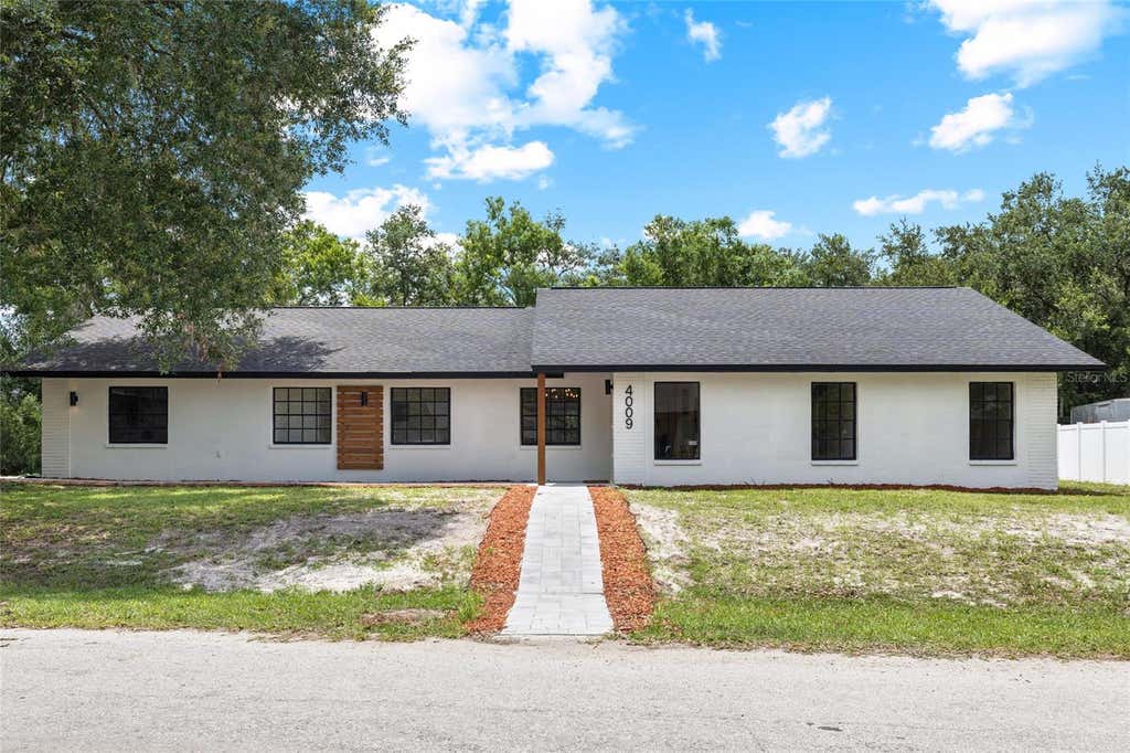 Photo of 4009 Sprucewood Place, Land O Lakes, FL 34639 (MLS # TB8526832)