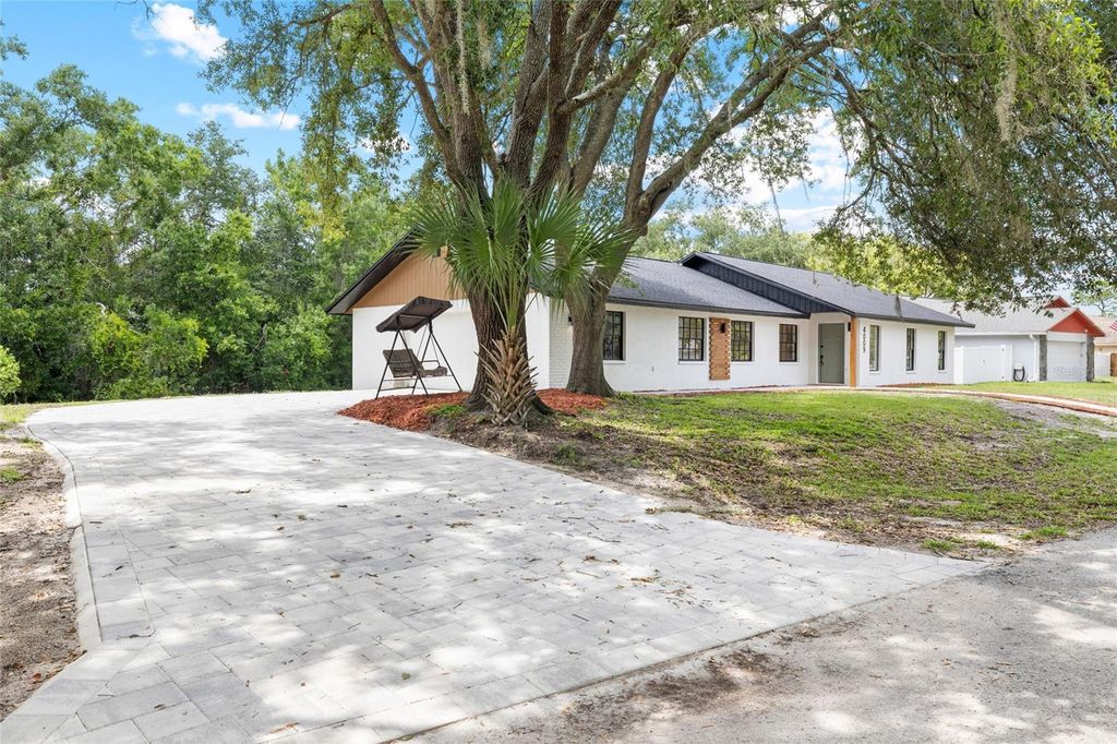Photo of 4009 Sprucewood Place, Land O Lakes, FL 34639 (MLS # TB8526832)