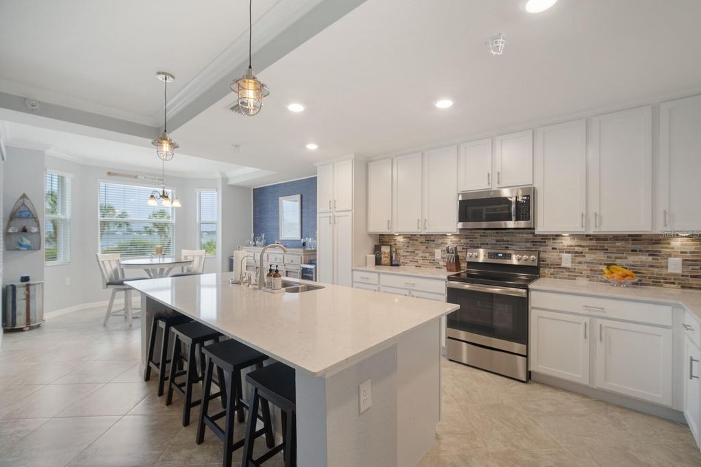 Photo of 910 Tidewater Shores Loop #103, Bradenton, FL 34208 (MLS # A4651931)