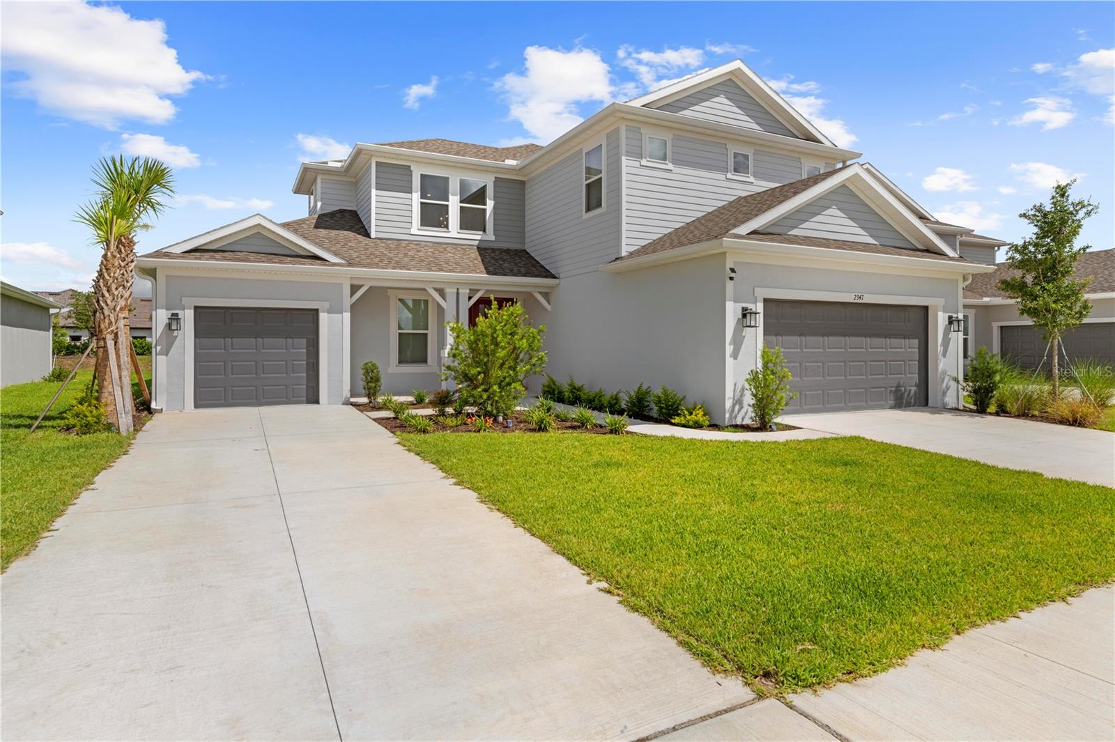 Experience luxury and convenience in this like-new Taylor Morrison Tortola model, offering 5 bedrooms, 4.5 baths, and a 3-car garage on a premium lot with no front or rear neighbors. Located in the gated River Landing community of Wesley Chapel, this home has been lightly lived in for only 3 months—the seller is relocating for a job transfer, making this your opportunity to move in within 40 days!
With 3,461 sq ft of well-designed living space, this home features:
Two first-floor bedrooms, including a spacious owner’s suite with pond views, spa-like bath, and dual walk-in closets
A chef’s kitchen with quartz countertops, gas cooktop, double ovens, oversized island, and walk-in pantry
Open-concept living and dining areas with high ceilings and abundant natural light
Panoramic screened lanai with a fully equipped outdoor kitchen and built-in grill — ideal for entertaining or relaxing
Upstairs loft and media room, plus three generously sized bedrooms and two full baths
Enjoy peaceful views of the pond and conservation area with no rear neighbors—offering rare privacy and tranquility.
River Landing offers resort-style amenities including a clubhouse, pool, tennis and pickleball courts, dog park, playground, outdoor gym, and scenic trails. Minutes from top-rated schools, Tampa Premium Outlets, Wiregrass Mall, dining, and major highways.
Don’t wait to build — this turn-key home is ready now!