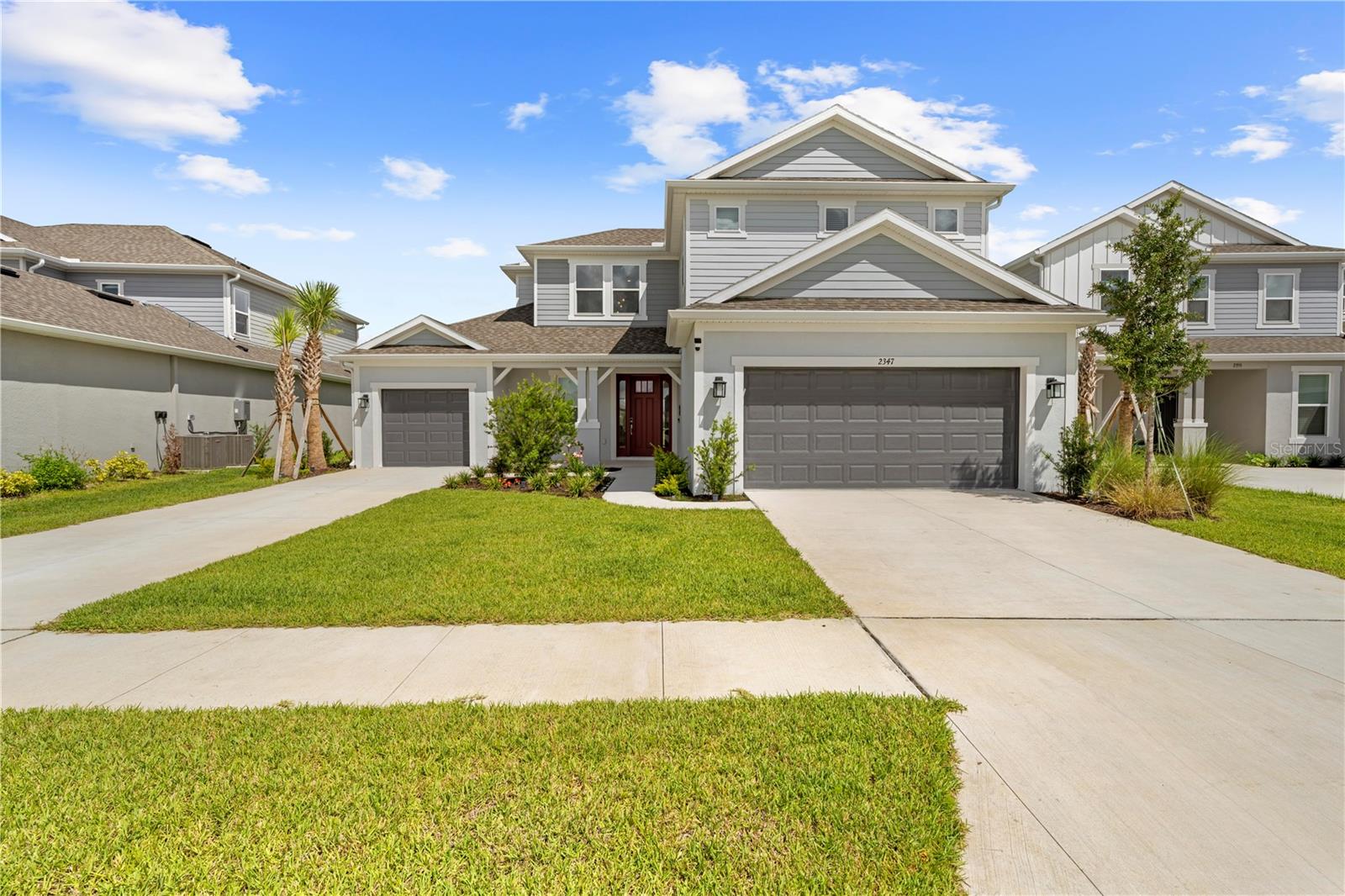 One or more photo(s) has been virtually staged. Experience luxury and convenience in this like-new Taylor Morrison Tortola model, offering 5 bedrooms, 4.5 baths, and a 3-car garage on a premium lot with no front or rear neighbors. Located in the gated River Landing community of Wesley Chapel, this home has been lightly lived in for only 3 months—the seller is relocating for a job transfer, making this your opportunity to move in within 40 days!
With 3,461 sq ft of well-designed living space, this home features:
Two first-floor bedrooms, including a spacious owner’s suite with pond views, spa-like bath, and dual walk-in closets
A chef’s kitchen with quartz countertops, gas cooktop, double ovens, oversized island, and walk-in pantry
Open-concept living and dining areas with high ceilings and abundant natural light
Panoramic screened lanai with a fully equipped Outdoor Kitchen Rough-In ideal for entertaining or relaxing
Upstairs loft and media room, plus three generously sized bedrooms and two full baths.
Additional upgrades include the dry/wet bar in the kitchen, an Extended Lanai, A whole home water filtration system, gutters, and an electric car charger in the garage.
Enjoy peaceful views of the pond and conservation area with no rear neighbors—offering rare privacy and tranquility.
River Landing offers resort-style amenities including a clubhouse, pool, tennis and pickleball courts, dog park, playground, outdoor gym, and scenic trails. Minutes from top-rated schools, Tampa Premium Outlets, Wiregrass Mall, dining, and major highways.
Don’t wait to build — this turn-key home is ready now!