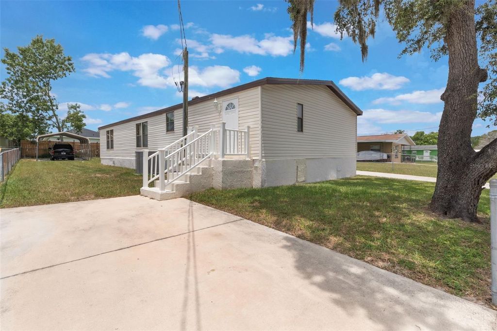 Photo of 127 E Northside Drive, Lake Wales, FL 33853 (MLS # O6327590)