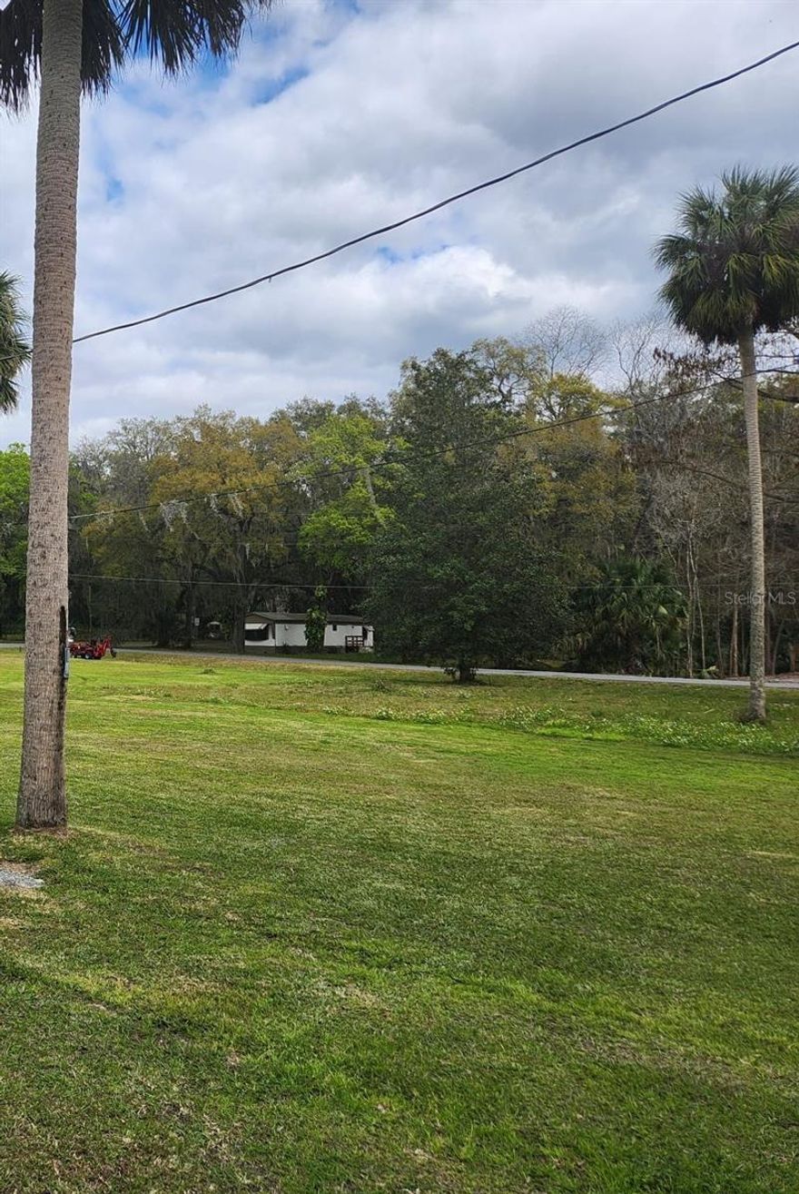 Build your future in beautiful Central Florida! This residential cleared vacant lot is an excellent option for affordable living or a smart investment opportunity. The adjacent lot is also available for sale separately, as well as the mobile home next to it is for sale separately as well. Buyers have the unique option to purchase all three properties. Situated on a quiet paved road, the property offers electricity and public water connection nearby. There is no HOA, you’ll enjoy flexibility with no additional restrictions or fees. Just minutes from Lake Panasoffkee, public boat ramps, CR 470, US-301, and I-75, this location provides easy access to The Villages, Ocala, Orlando, and Tampa. The area is well known for boating, bass fishing, wildlife, and outdoor recreation. Whether you’re planning a primary residence, weekend retreat, or long-term
investment, this lot offers the perfect balance of peaceful small-town living and connectivity to Central Florida’s growing markets. Additionally, the mobile home located next to this property is also for sale, offering a great
opportunity for buyers interested in purchasing both the lot and an existing home. Don’t miss this opportunity to secure your piece of Florida living!