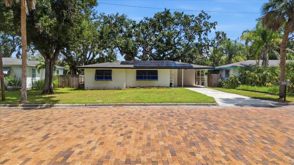 Photo of 1837 Pasadena Drive, Dunedin, FL 34698 (MLS # W7889080)