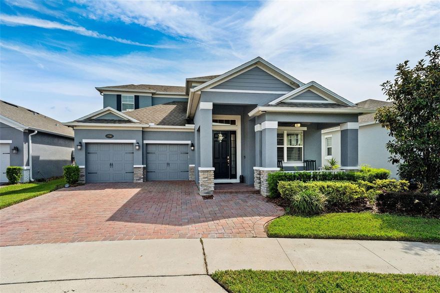 Built in 2019, this stunning 4-bedroom, 3.5-bathroom residence combines timeless craftsmanship with modern sophistication in one of Winter Garden’s most desirable locations. Offering over 3,100 square feet of thoughtfully designed living space, this home pairs elegant interior finishes with extensive upgrades that make everyday living both effortless and refined.

Step inside to find custom interior shutters, crown molding, and enhanced trimwork throughout, setting a tone of understated luxury. The chef’s kitchen impresses with double ovens, a gas cooktop, and a spacious layout that seamlessly connects to the open family room—complete with a custom-built entertainment center and cabinetry. Upstairs, the loft features a custom wet bar with built-in cabinetry, lighting, and sink—an ideal space for entertaining or relaxing at the end of the day.

Retreat to the primary suite, where automatic blinds, a custom closet system, and a serene ensuite bath create a true sanctuary. Each bedroom includes customized storage, reflecting thoughtful attention to detail throughout the home.

Outdoor living is equally remarkable: a fully equipped outdoor kitchen with kegerator, natural gas fire pit, outdoor shower, and motorized screens make this space perfect for year-round enjoyment. The custom second-floor porch adds an elevated retreat overlooking the property.

Practical features abound, including a whole-home generator (serviced annually), saltwater and carbon filtration system, gas tankless water heater, new dishwasher and disposal, and metal shelving in the garage for optimized storage. Even exterior details—like added outlets for holiday lighting—reflect the home’s careful design.

This property has been meticulously maintained, with biannual HVAC servicing, monthly pest control, a subterranean termite bond, annual generator and backflow servicing, and more—all ensuring peace of mind and long-term value.

The neighborhood offers a beautiful community pool, just a short walk from the property. It is golf-cart friendly, too! Located just steps from the West Orange Trail, this home offers convenient access to historic Downtown Winter Garden, local shops, dining, and top-rated schools including Dillard Street Elementary, Lakeview Middle, and West Orange High.