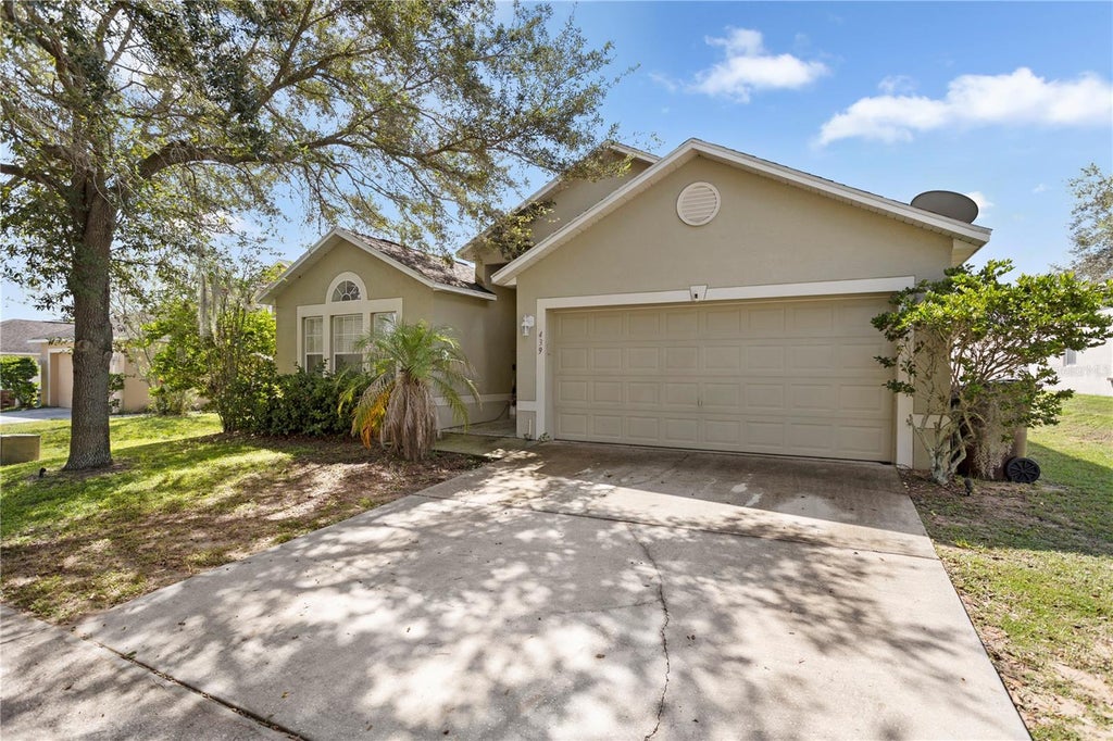 Photo of 439 Hammerstone Avenue, Haines City, FL 33844 (MLS # O6444244)