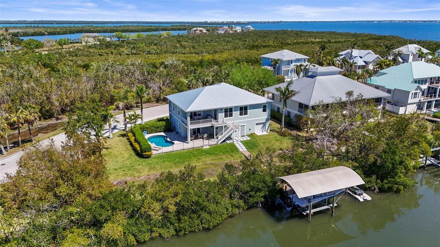 Welcome to 4109 Cobia Ct—a remarkable custom-built waterfront home where luxury, privacy, and modern convenience meet in perfect harmony. Built in 2017 with solid all-block construction (even on the second story) and a durable metal roof, this 4-bedroom, 3.5-bath residence is rarely available on Snead Island, one of the area’s most exclusive and tucked-away waterfront communities—private, peaceful, yet still close to everything.
Situated on an oversized lot with 134 feet of direct saltwater canal frontage, this home offers no fixed bridges to the Gulf, making it a true boater’s paradise. Enjoy a composite dock with walk-way lights, water and electric, Covered boat lift, floating dock for your Jet Ski, and your very own gas-heated pool with LED lighting, deck jets, and a travertine deck—perfect for entertaining or soaking in the sunshine. The pool is fully gated, and just beyond, a spacious yard offers plenty of room for you're outdoor activities.
Inside, you’ll find a light-filled open floor plan with expansive ceilings, Luxury Coretec waterproof flooring, elegant tray ceilings, and a fresh, coastal-inspired design. The chef’s kitchen features high-end stainless steel appliances, an oversized island with views of the backyard and canal, a generous walk-in pantry, and smart-home technology integrated throughout. The split bedroom layout offers privacy for everyone, with both the primary suite and a secondary bedroom featuring ensuite bathrooms.
The five-car garage includes epoxy floors, an EV charger outlet, and is pre-wired for a backup generator. It opens to a versatile lower-level flex space—perfect as a man cave, game room, or poolside retreat—with direct access to the lanai and pool area that enjoys ideal southern exposure. Additional standout features include PGT impact windows and doors, closed-cell spray foam insulation, LED lighting throughout, and composite decking with stainless fasteners for long-lasting durability. The home is also equipped with a full security system and modern smart-home setup.
The location is just as special. Walk or bike to Emerson Point Preserve, a beautiful nature sanctuary for hiking, fishing, and wildlife viewing. Or take your golf cart to the Bradenton Yacht Club for private dining, social events, and fueling up your boat before heading out on the water. This is more than just a home—it’s the ultimate Florida lifestyle. Newer construction on Snead Island is incredibly rare, and this one checks every single box. Experience it for yourself and Schedule for your private showing today!