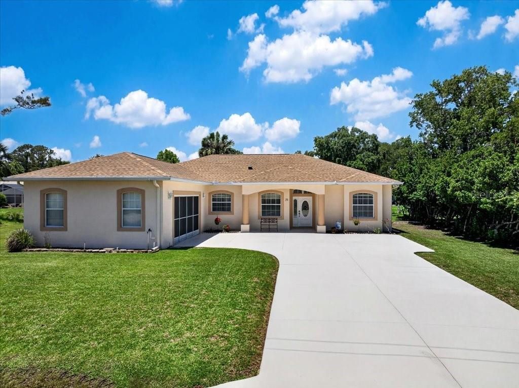 Photo of 25 Westminster Drive, Palm Coast, FL 32164 (MLS # FC318039)