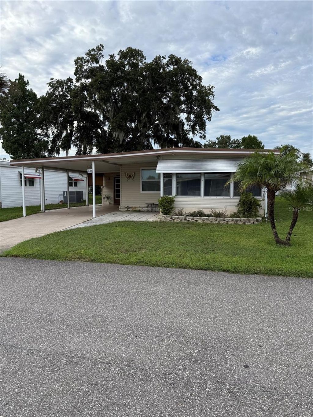 Photo of 170 Paradise North, Leesburg, FL 34788 (MLS # G5102404)