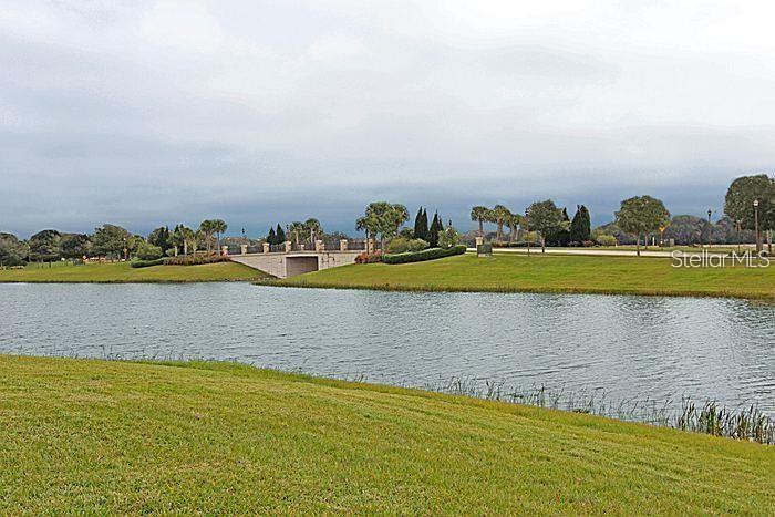 Lovely water view home with 3 car garage in sought after Bellelago. Completely remodeled with nice upgrades. This is a beautiful 5 bedroom, 4 1/2 baths, and additional loft w/ entertainment center area and over 3700 sq ft of living space. Very popular Venezia model on the water with direct lake access to Lake Toho from your back yard. The master suite wing is located downstairs with elegant French Doors that lead into the fully upgraded master bath. His & Hers closets, trey ceiling and a spectacular view right from your bed will greet you every morning. There is a 2nd jr. suite on the 1st floor with its own private bath for your guests convenience. The entire first floor has upgraded ceramic tile and the kitchen is fully appointed with expresso cabinets and a beautiful granite countertop as well as the stainless steal hardware package. Crown molding also adds to the elegance of the first floor while the open and spacious loft upstairs offers a play area or an extra living space. All located on an oversized, cul de sac lot that is over 1/4 acre with views of the water from almost every room. Bellalago is an award winning community that offers its residents Resort Style Living at its greatest. 24hr gated security, 3 pools, 2 fitness centers, daily classes and boating as well. Rent includes TV cable fee.