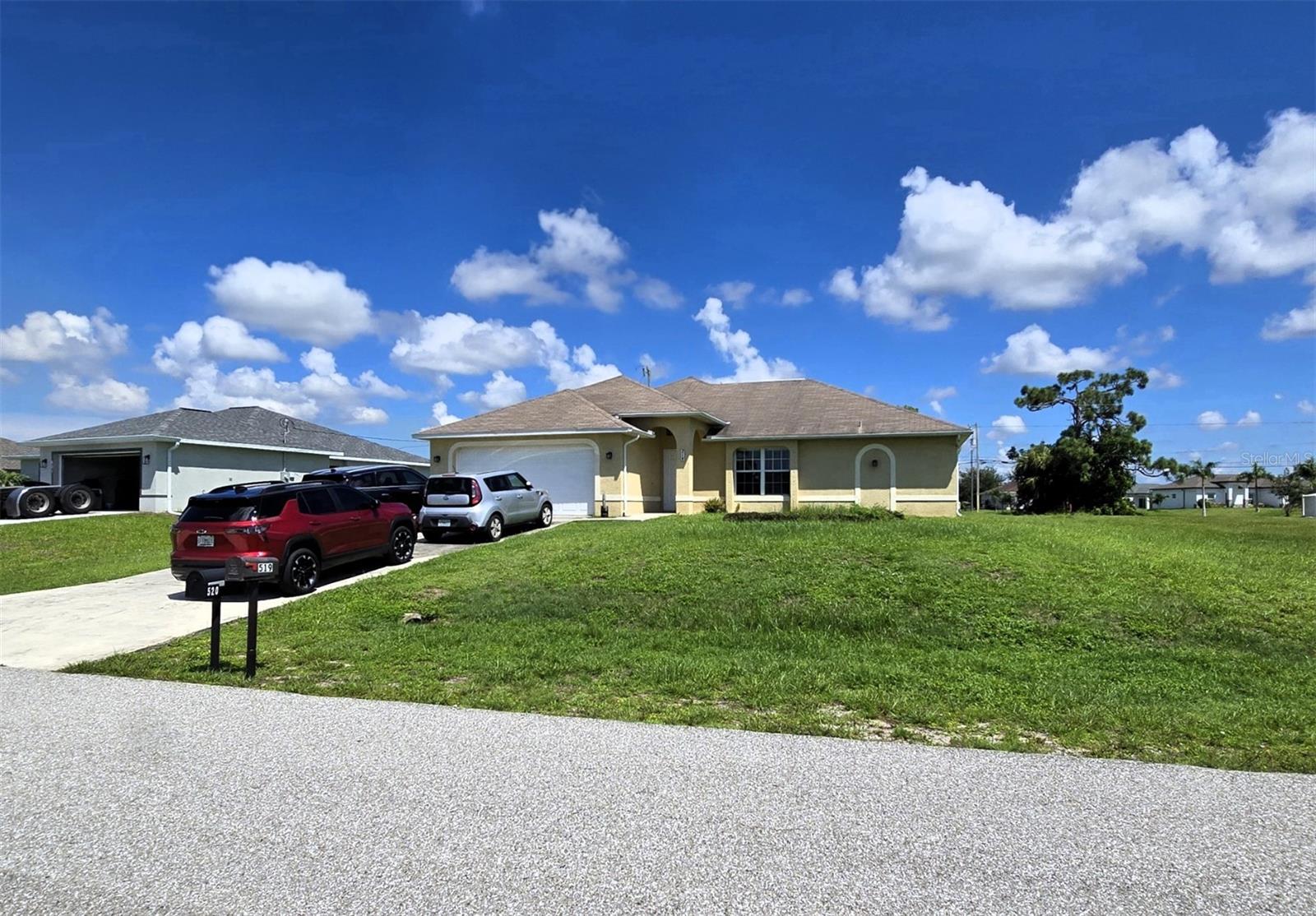Well-maintained home in a prime Cape Coral location! Enjoy a spacious open lot surrounded by lush green grass, all outside the flood zone, for peace of mind. This property features a 2-car garage and plenty of outdoor space, making it perfect for Florida living.