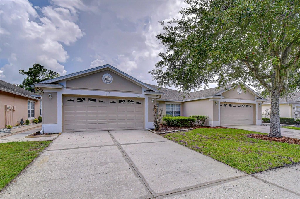 Photo of 31501 Shaker Circle, Wesley Chapel, FL 33543 (MLS # TB8525276)