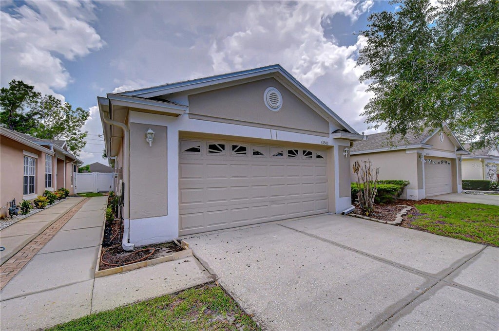 Photo of 31501 Shaker Circle, Wesley Chapel, FL 33543 (MLS # TB8525276)