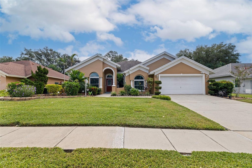 Photo of 903 Whippoorwill Drive, Palm Harbor, FL 34683 (MLS # TB8553434)