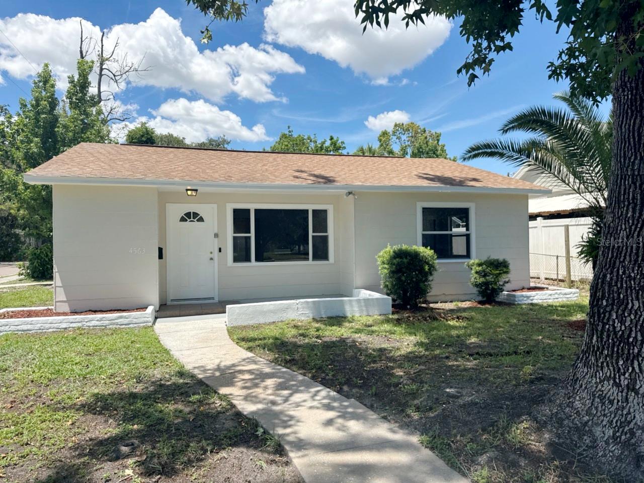 Centrally located updated home with 3 bedrooms and 2 bathrooms - Open floorplan with large kitchen. New exterior paint and interior paint. New flooring throughout - Updated Bathrooms. No Flood insurance required and minutes to Downtown St Petersburg, Shopping and beaches. Close to schools and parks. Make this your new St Petersburg Home!