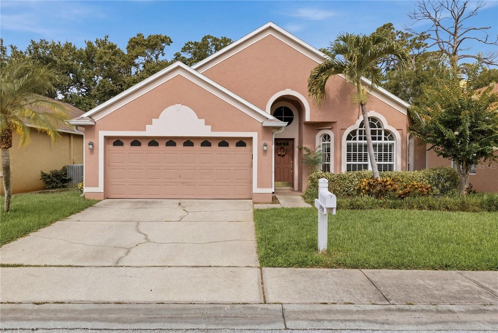 Photo of 14990 Hidden Oaks Circle, Clearwater, FL 33764 (MLS # TB8511243)