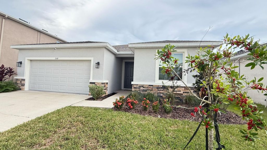 Photo of 2518 Chapel Oak Bend, Wesley Chapel, FL 33543 (MLS # TB8402092)