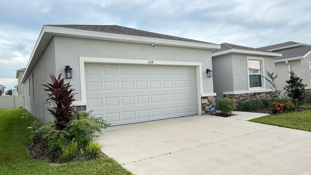 Photo of 2518 Chapel Oak Bend, Wesley Chapel, FL 33543 (MLS # TB8402092)