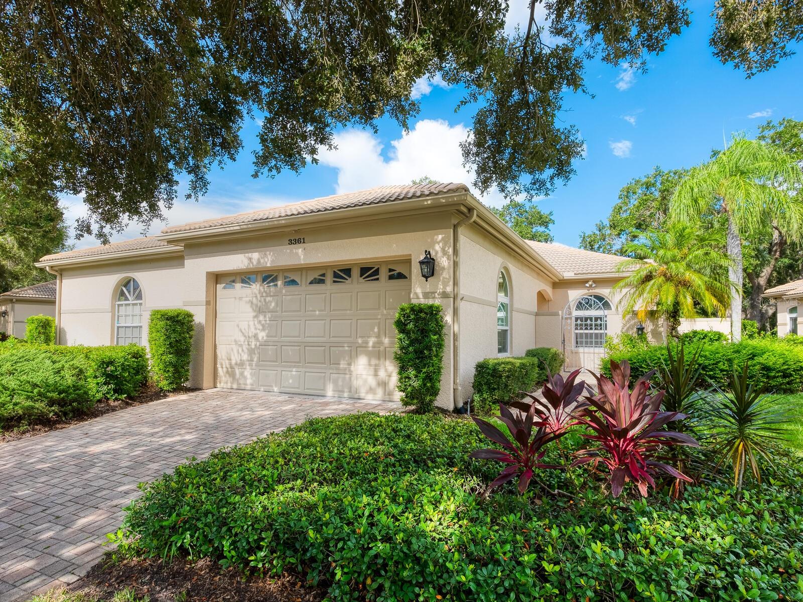 Tranquil garden views from this beautiful and secure villa in sought-after Highlands section of The Meadows, a 1,600-acre oasis in an enviable location. Meandering canopied streets, a paver driveway and private front patio welcome you home. Inside, you will love the high ceilings, natural light brought in by the wall of sliders in the Florida room, hardwood floors in the great room, and beautifully updated kitchen with white shaker cabinets and Starlight Gray quartz countertops. The ample primary suite offers a custom walk-in, double vanities and a step-in shower. Relax and entertain with ease in the cheerful Florida room with western exposure for daily sunsets through the trees. All with hurricane protection throughout, just 50 ft. to one of the two heated community pools and minutes to all the fun The Meadows has to offer. The Meadows, 1,600 park-like acres in an enviable location, is a resort lifestyle community 15 minutes from downtown. Residents enjoy 14 miles of trails, fun activities, fitness center, Junior Olympic pool, 10 pickleball courts plus, pay-to-play three 18-hole golf courses and a top-notch tennis complex. You’ll live near award-winning beaches, remarkable arts and culture, Nathan Benderson Park, Mote SEA Aquarium, Whole Foods, Trader Joe’s and The Mall at University Town Center, a world-class shopping, entertainment and dining destination. A fabulous Florida lifestyle awaits! 2022 new electrical service, 2018 replumbed, 2017 air-conditioning system, 2007 tile roof which is the condominium’s responsibility, above flood plain in flood zone X.