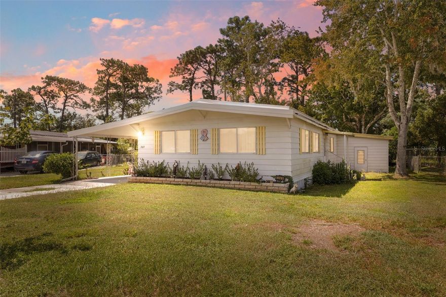 This 2 bedroom, 2 bath home with a covered carport wraps you in a sense of comfort the moment you walk through the door, like a favorite sweater on a cool morning. With a brand new roof installed in January 2025, it offers the kind of security that lets you settle in and breathe easy. Inside, the kitchen’s warm wood cabinetry and brick backsplash feel like the heart of the home, perfect for slow breakfasts and shared stories. Sunlight pours into the living and dining areas, casting a gentle glow on vintage touches and cozy corners. The sunroom, lined with windows, is a quiet haven for morning coffee or afternoon daydreams, while the bedrooms offer soft light, generous storage, and a feeling of calm. Step outside to a peaceful yard with a private shed, ideal for gardening tools, holiday decorations, or a weekend project space. This home is nestled within High Point Community, a gated 55+ neighborhood known for its vibrant lifestyle and welcoming atmosphere, where residents enjoy access to an 18-hole golf course, driving range, solar heated swimming pool, and a variety of sports courts including tennis, pickleball, shuffleboard, bocce ball, and horseshoe pits. Just 3.2 miles away, Weeki Wachee Springs State Park offers magical mermaid shows and serene kayaking, while Pine Island Beach, only 7.8 miles from home, invites you to unwind with sunsets and sea breezes. Cortez Commons, just 2.5 miles away, makes errands easy with shopping and dining close by, and with the Suncoast Expressway only 5.6 miles from your doorstep, commuting to Tampa or exploring the Gulf Coast is smooth and simple. This isn’t just a house—it’s the kind of place that feels like it’s been waiting for you.