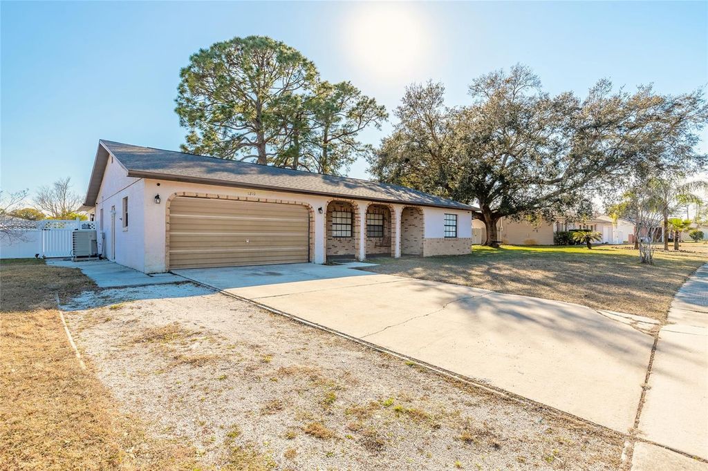 Photo of 1210 Mellisa Drive, Port Orange, FL 32129 (MLS # NS1087252)