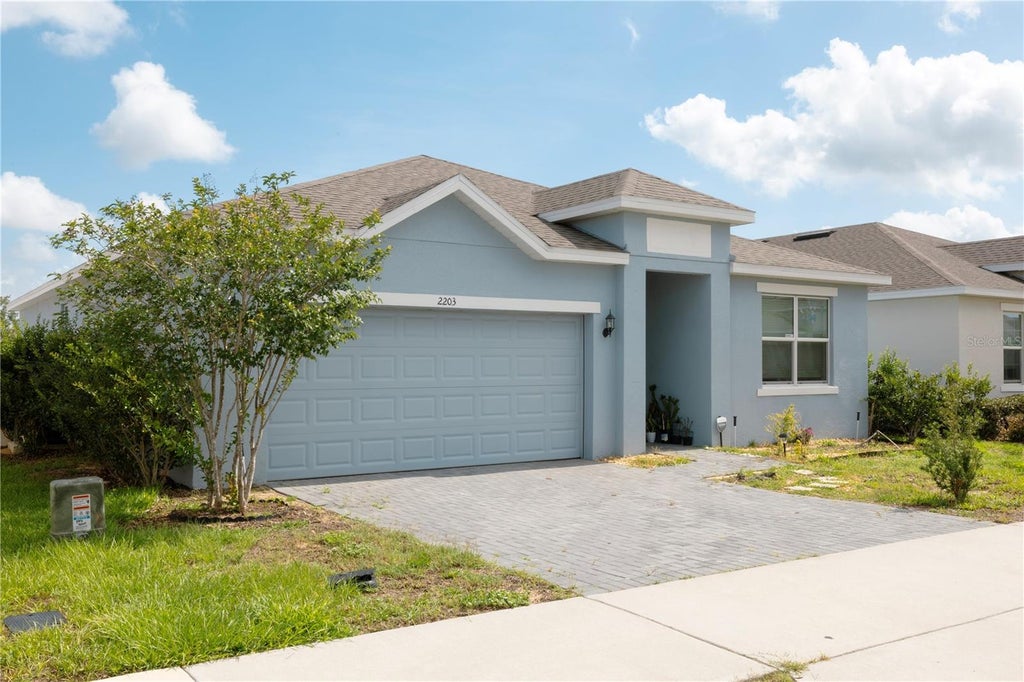 Photo of 2203 Pigeon Plum Drive, Haines City, FL 33844 (MLS # O6411185)