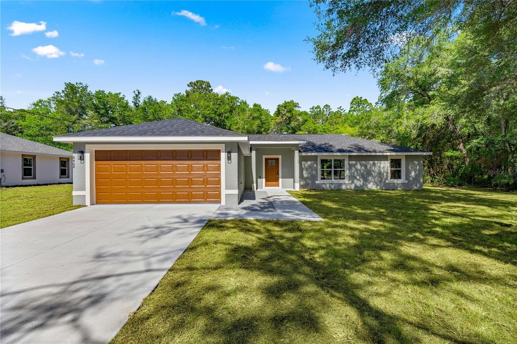 Photo of 6404 SW 202nd Court, Dunnellon, FL 34431 (MLS # OM724850)