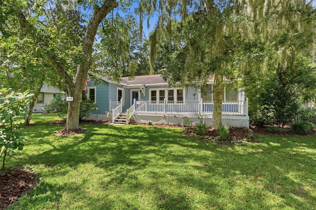 Photo of 18734 NW 240th Street, High Springs, FL 32643 (MLS # GC543338)