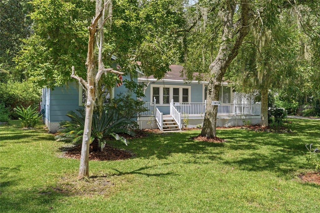 Photo of 18734 NW 240th Street, High Springs, FL 32643 (MLS # GC543338)