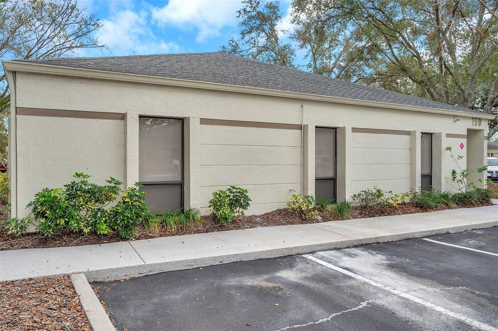 This 2,020 SF two-unit office suite is available for purchase in the highly desirable Lutz Landing.
Unit A is thoughtfully designed and has received recent updates, including new lighting, fresh paint, updated bathroom fixtures, and a new HVAC system. The layout features a spacious, welcoming waiting area that can accommodate 6-7 people, with additional room for reception or office space. It also includes an open bullpen area, two executive offices, a conference room, and a restroom/utility closet at the rear.
Unit B has been recently upgraded with new flooring throughout, new cabinetry and countertops, a newly installed HVAC system, and updated lighting, offering a modern and comfortable work environment. It also features an updated bathroom and is ready for immediate occupancy.
The office complex enjoys excellent visibility, with 45,000 vehicles passing daily along US 41. It is ideally located just north of the Bearss Avenue/I-275 Interchange.