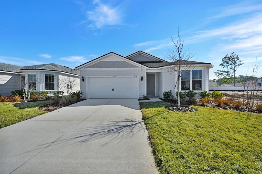 Photo of 83 Lake Manatee Drive, Palm Coast, FL 32137 (MLS # G5116200)
