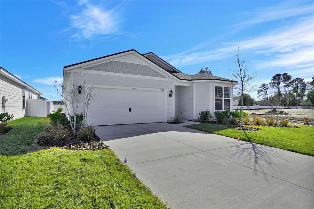 Photo of 83 Lake Manatee Drive, Palm Coast, FL 32137 (MLS # G5116200)