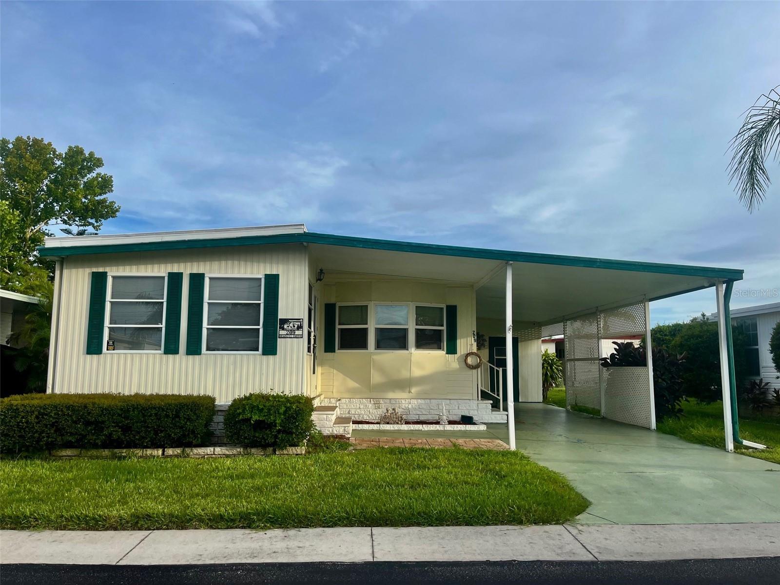 Your Move-In Ready Oasis Awaits as you step into this charming two-bedroom, two-bath home, partially furnished and designed for immediate, comfortable living. Enjoy the sleek & durable appeal of luxury vinyl tile throughout, offering both beauty and easy maintenance. Peace of mind comes standard w/a new roof installed in 2024, ensuring years of worry-free enjoyment. The heart of the home, the kitchen, boasts an inviting island kitchen layout w/recently upgraded, matching appliances, making meal preparation & entertaining a delight. Stay cool & comfortable year-round w/a central AC unit installed in 2018, & benefit from the efficiency of a hot water heater installed in 2022. For added convenience, an outdoor storage shed is included, equipped with washing machine & dryer hookups, providing a dedicated laundry area & extra storage space. Unparalleled 55+ Community Amenities & Value Tarpon Shores offers an exceptional array of activities, creating a vibrant & active community for its residents: Community Center: The bustling hub for social gatherings and events. A Sparkling Swimming Pool: Perfect for refreshing dips and soaking up the Florida sun. Pickleball Courts: Stay active and engage in friendly competition. Full Chef's Kitchen: Ideal for community potlucks & special events. A Billiards Room & Card Tables: Enjoy games and good company with neighbors. A Library: For a quiet retreat for reading and relaxation. Shuffleboard: Classic fun for all skill levels. Beyond the fantastic facilities, Tarpon Shores fosters a strong sense of community with numerous clubs, including a lively Social Club & an engaging Women's Club. Throughout the year, residents enjoy a diverse calendar of activities, making it easy to connect with new friends. Experience true worry-free living with low maintenance fees that cover a comprehensive list of services: water, sewer, cable, internet, common grounds, yard & pool maintenance. Plus, benefit from the convenience of a full-time Office Manager and Property Manager on-site, dedicated to the community's smooth operation. Embrace the Tarpon Springs Lifestyle: Living in Tarpon Shores means embracing the rich culture and natural beauty of Tarpon Springs, a truly unique Gulf Coast city. Famous for its historic Sponge Docks, you can explore authentic Greek restaurants, charming boutiques, and witness sponge divers in action. Beyond the docks, Tarpon Springs offers: Pristine Beaches: A short drive to stunning Gulf beaches like Fred Howard Park Beach and Sunset Beach, perfect for swimming, sunbathing, and breathtaking sunsets. Outdoor Recreation: Enjoy boating, fishing, kayaking, and paddle boarding in the calm waters of the Gulf and its many bayous. The Pinellas Trail, a paved multi-use path, is also nearby for walking and biking enthusiasts. Cultural Attractions: Discover local art galleries, museums, and enjoy various festivals and events held throughout the year that celebrate the city's Greek heritage and vibrant community spirit. Dining & Shopping: From fresh seafood to quaint shops, Tarpon Springs offers a delightful array of culinary experiences and unique shopping opportunities. Quaint Downtown: Explore the charming historic downtown area with its unique shops and local eateries. Tarpon Shores Mobile Home Community offers more than just a home; it offers a lifestyle of comfort, convenience, and community in one of Florida's most enchanting cities. Are you ready to discover your new beginning in Tarpon Springs?