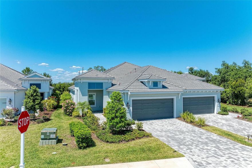 One or more photo(s) has been virtually staged. Welcome to Indigo in Bradenton, Florida! Built in 2023 by Neal Communities, this
beautifully maintained Sandcastle villa offers 3 bedrooms, 2 baths, plus a versatile den/flex
room with 1,832 sq ft under air (2,596 total). Ideally positioned facing a peaceful preserve,
the screened lanai provides a private setting to relax and enjoy Florida living.
The open-concept design features maple cabinetry with upgraded 42" uppers, undercabinet lighting, roll-out shelving, stainless steel appliances, and dimmer lighting in main living areas. The spacious primary suite includes an impressive 11x6 walk-in closet with
added shelving. Additional highlights include ceiling fans with lights throughout, an interior
laundry with a washer and dryer included, abundant storage, and a 2-car garage with extra driveway parking.
Upgrades include range and dryer outlet conversions (electric or gas), home security
system, Levolor S-shaped vertical blinds, and a screened lanai.
Indigo offers a vibrant lifestyle with a private villa, pool, and outdoor kitchen, plus a main
clubhouse featuring a café, kitchen, resort-style pool and spa, fitness center, and pickleball
courts, and a full-time activities director coordinating social events and classes.
Conveniently located near beaches, golf, shopping, dining, schools, and more.
Ideal for full-time living or a seasonal retreat.