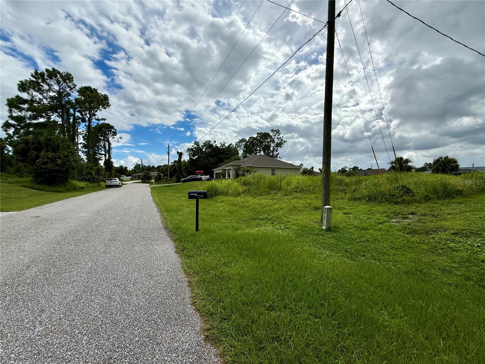 Looking for that perfect piece of land to build your slice of paradise on? Here's a great lot in this fabulous area of North Port! NO flood insurance required, save money and build with confidence!!! Electric at site, and no need to worry about mitigating Scrub Jays as property is NOT located in a habitat. Greenbelt running along back of property giving additional privacy space. Bring all your toys...store your RV, boat, kayaks, put up a detached garage, shed for an art studio, trampoline, or treehouse, doesn't matter as this is a non-deed restricted area of Sarasota County! And of course, what could be more Florida than having your own pool which the property has plenty of room for! Property is close to all amenities including sandy beaches & crystal waters of Venice, Englewood & Boca Grande Beaches, Golf Courses, boat launches, minutes from TWO Spring training Stadiums, the Rays & the Braves who hosts games against the Yankees, Red Sox, Mets & more. Have local builder with floorplans of 3 bedroom 2 bathroom homes with 10’ ceilings, 8’ doors porcelain plank flooring throughout, Quartz/Granite, lighting & fans, appliances, Impact windows…all-inclusive pricing starting at $320,000.