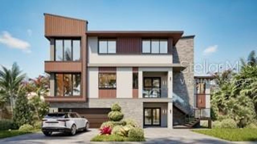 One or more photo(s) has been virtually staged. Under Construction. Experience modern coastal luxury in this newly constructed Pasadena Model Home, where striking contemporary architecture meets timeless Florida charm. Designed with clean lines and sunlit open spaces in cool gray tones, this residence blends style and function with effortless grace. Set within the exclusive gated Pasadena Yacht & Country Club community, this Skimmer Point masterpiece features a sparkling private pool and an impressive 4-car garage—perfect for those who value both elegance and practicality. Inside, sophisticated finishes, soaring ceilings, and seamless indoor-outdoor living spaces invite relaxation and entertaining alike. Residents have available the ability to join with a shorten wait time, the premier Pasadenta Yacht & CC with amenities including a private Arnold Palmer–designed golf course, full-service clubhouse, fine dining, tennis and pickleball courts, and an 80-slip marina accommodating yachts up to 80 feet. Just beyond the gates, discover the charm of downtown Gulfport—a short stroll away—offering boutique shopping, waterfront cafés, lively restaurants, and vibrant local markets. Including the luxury of Downtown St Petersburg, the beaches and Tampa, all of which just minutes away! This home is not just a residence—it’s a lifestyle defined by coastal sophistication and resort-style comfort.