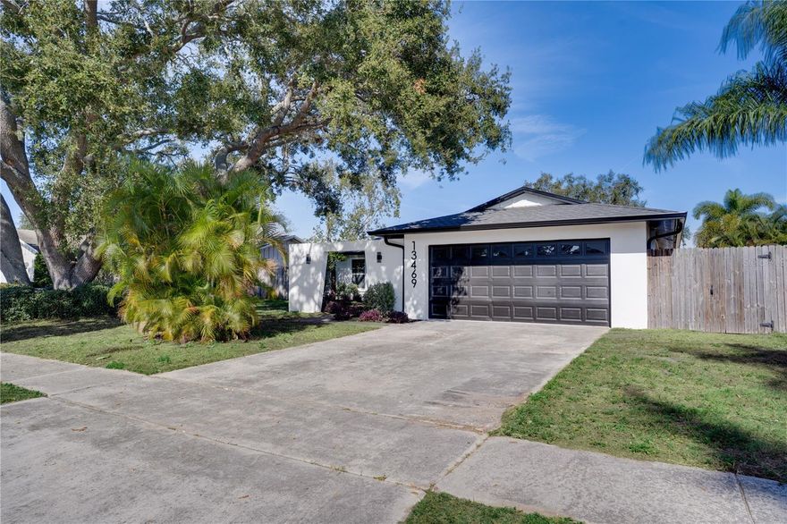 This beautifully updated 3 bedroom, 2 bath Largo home brings together modern style and easy living, featuring fresh interior and exterior paint, LVP flooring throughout, and a bright open layout that blends the living room, dining room, and kitchen seamlessly. The kitchen is a standout with stone countertops, stainless steel appliances, a stunning backsplash, recessed lighting, and an island that opens right up to the main living area, all framed by vaulted ceilings that add great volume and light. The primary bedroom offers a walk-in closet and a sleek en-suite with a walk-in shower, while the in-ground pool and large fenced backyard give you the perfect outdoor retreat. Tucked just minutes from the water—but in a non-flood zone—you’re also close to parks, beaches, shopping, dining, and entertainment. Don’t miss your chance to see this one—schedule your showing today!