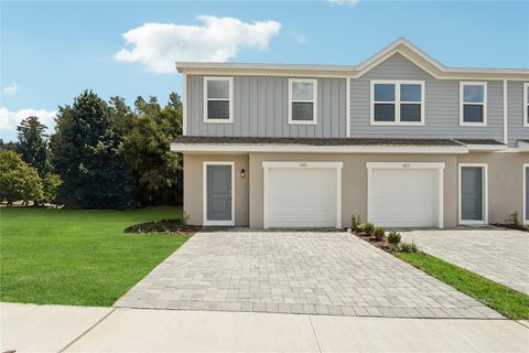 Photo of 1715 Fan Palm Drive, Davenport, FL 33897 (MLS # O6405090)