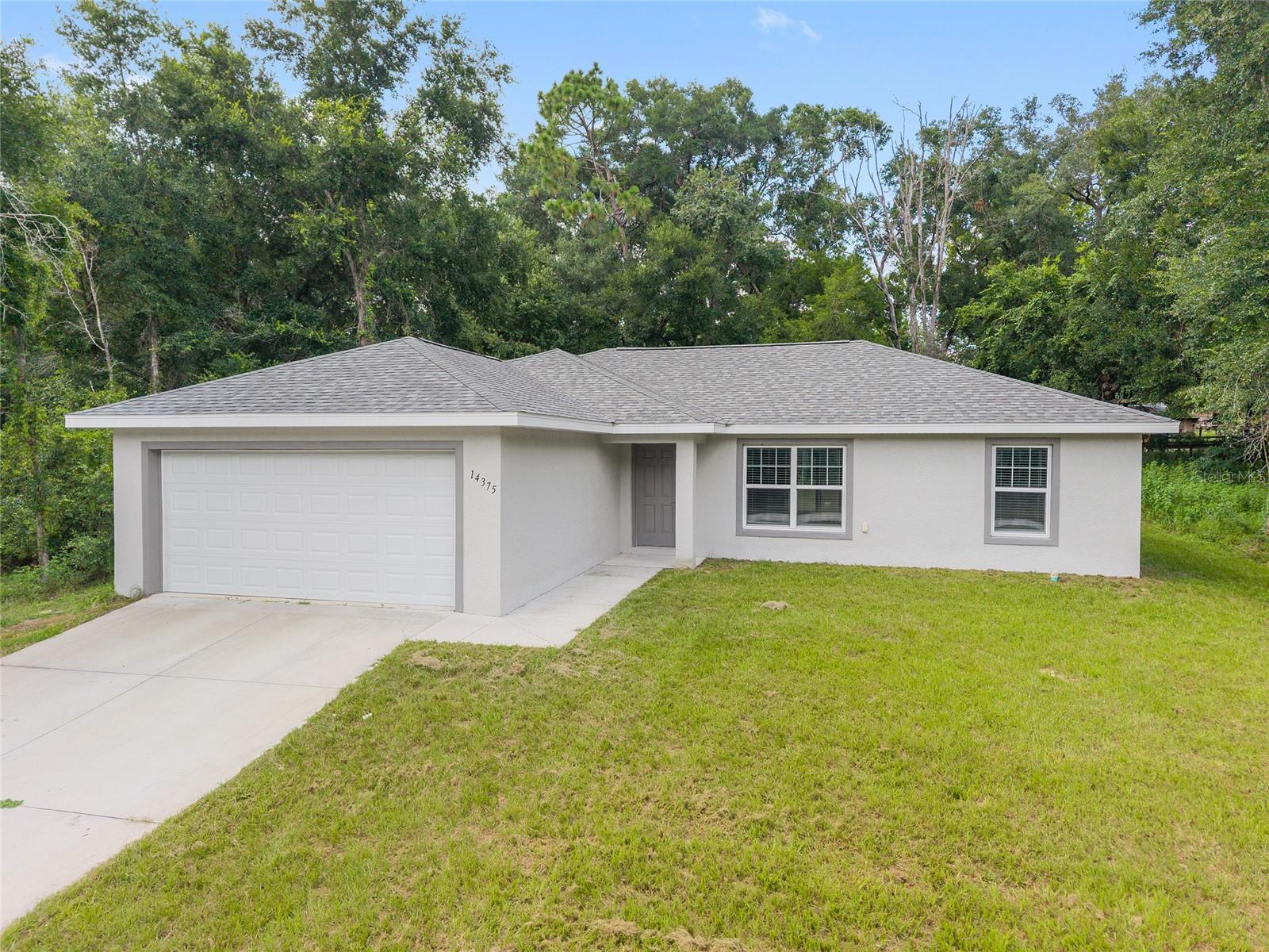 Built in 2023, this move-in ready concrete block home offers the perfect blend of modern comfort and peaceful surroundings—without the burden of an HOA! Enjoy added privacy as the backyard backs up to open pastureland, creating a serene backdrop for everyday living. The extended patio is ideal for outdoor entertaining, and a backyard shed provides convenient storage space.
Inside, the home features a desirable split-bedroom floor plan, offering privacy for the primary suite. Thoughtful upgrades include custom shelving in every closet and sleek, all-tile bathrooms for a clean and elevated finish. Whether you're hosting guests or enjoying a quiet night in, this home is designed to meet your needs in both style and function.