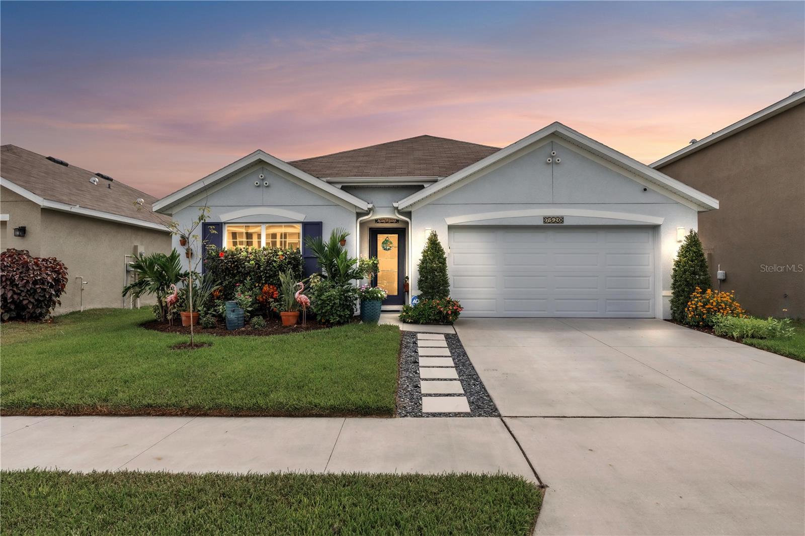 Temple Terrace Perfection: New Build, Prime Location. Step into this 2023 built 4-bedroom, 2-bathroom home in River Park. Meticulously maintained and move-in ready, the home is full of natural light thanks to its east-facing orientation. Large bedrooms, plentiful storage space & an open living, dining, kitchen layout provides for easy living. The kitchen features a custom backsplash, an upgraded farm house sink & newer stainless steel appliances. The fenced backyard is a true oasis with an extended patio & beautiful landscaping. Practical upgrades include irrigation and an EV charging station. Enjoy quick access to downtown, Armature Works, The Wharf, VA Center, Tampa outlets, and all your favorite shopping and dining.