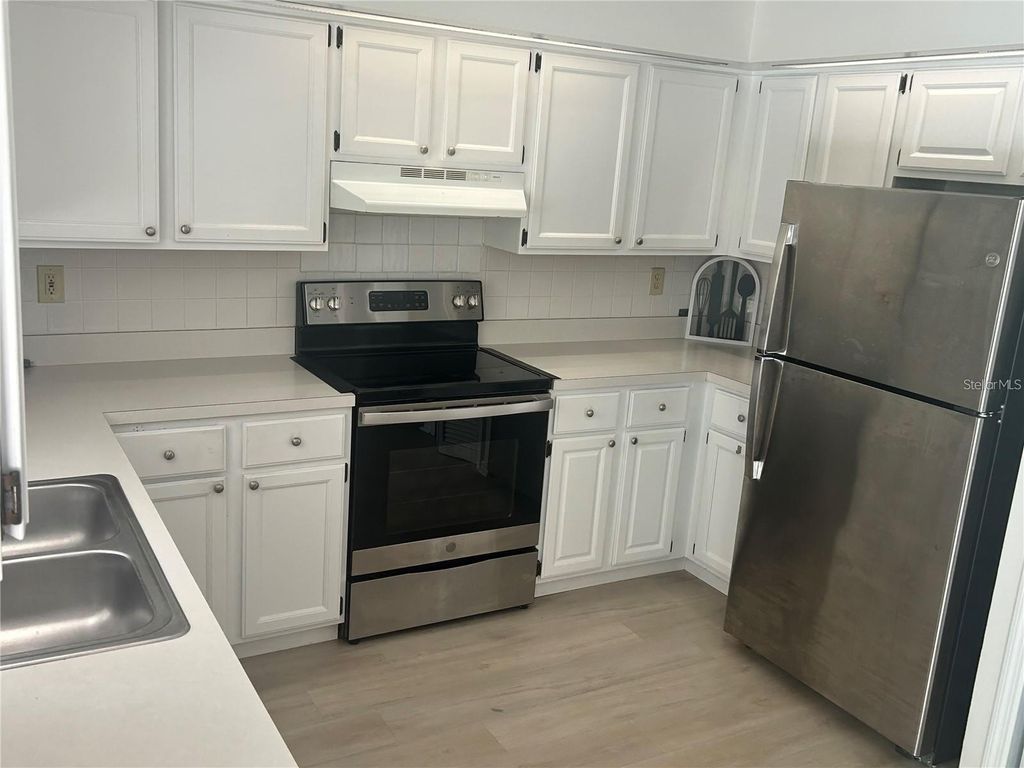 Photo of 613 Bayport Drive, Kissimmee, FL 34758 (MLS # W7880082)