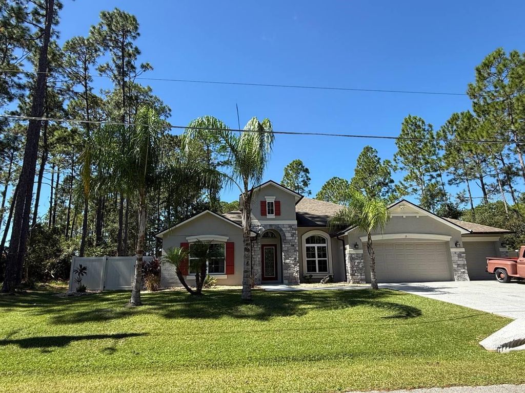 Photo of 15 Lake Placid Lane, Palm Coast, FL 32137 (MLS # FC313370)